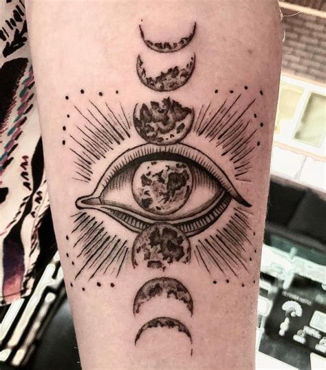 Eye and Moon Phases Sagittarius Tattoo