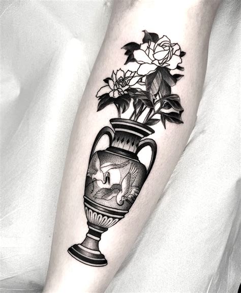 Vase with Leaves Sagittarius Tattoo