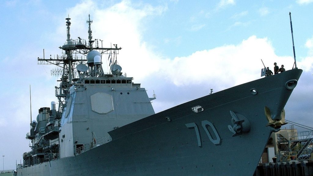 Picture showing the AN/SPY-1 radar antennas are the light grey octagonal panels on the front and starboard side of the superstructure of USS Lake Erie. Credit: Wikipedia.
