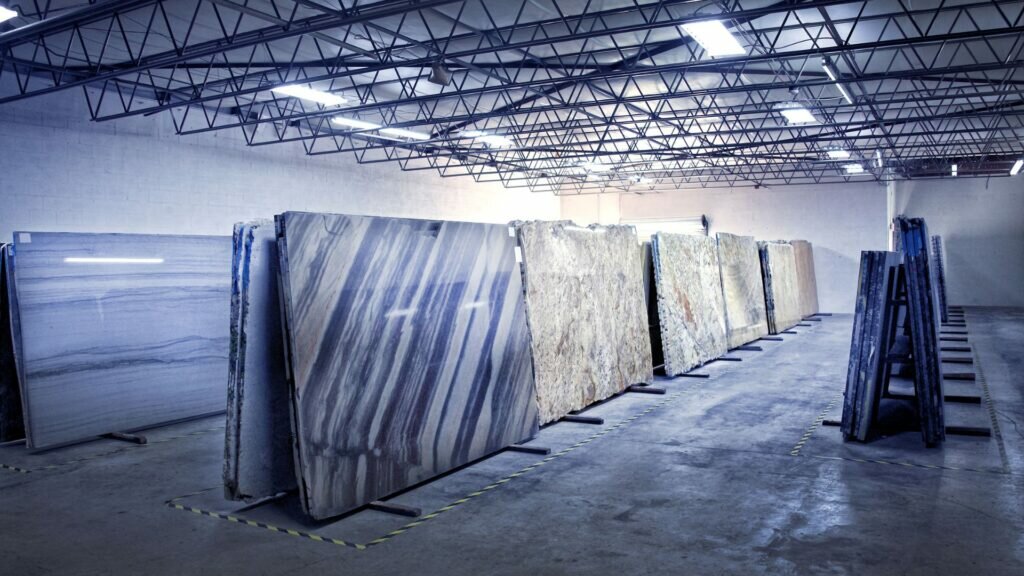 An impressive lineup of granite slabs displaying a variety of hues and textures.